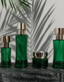 Luxury 40ml 100ml 120ml Empty Green Glass Cosmetic Packaging Set Lotion Pump Bottles Cream Jars with Gold Lid Packaging