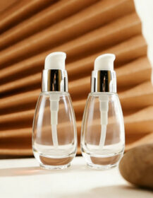 Cosmetic Glass Bottle Package Round 30ML Glass Bottle with Cream Pump Customized Thick Glass Bottle Package for Face Serum