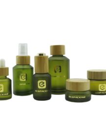 Luxury Slant Shoulder Frosted Olive Green Glass Spray Lotion Pump Bottle Cosmetic Jar Set with Bamboo Lid
