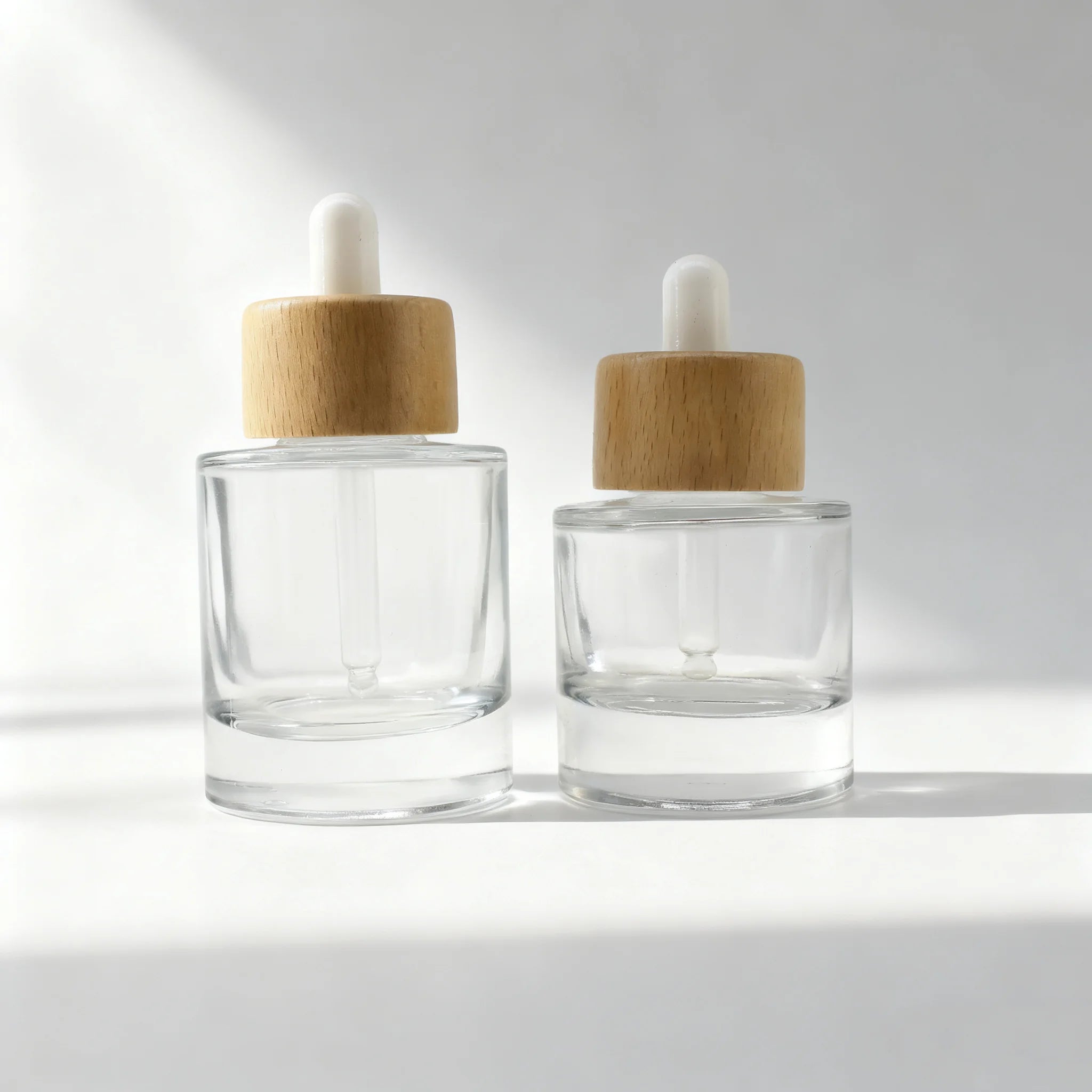 Cosmetic Thick Bottom 15ml 30ml 50ml Flat Shoulder Clear Glass Serum Dropper Bottle With Wood Lid - 图片 4