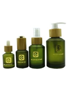 Natural Packaging Slant Shoulder Glass Bottles Cream Cosmetic Glass Jar with Bamboo Pump Set Packaging 30ml 50ml 100ml