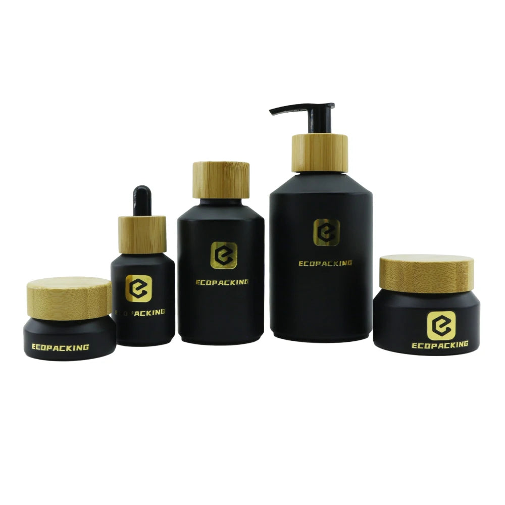 Wholesale Customized Black Frosted Essential Oil Glass Bottle Packaging Serum Lotion Bottle 30ml Skin Cream Glass Cosmetic Jars