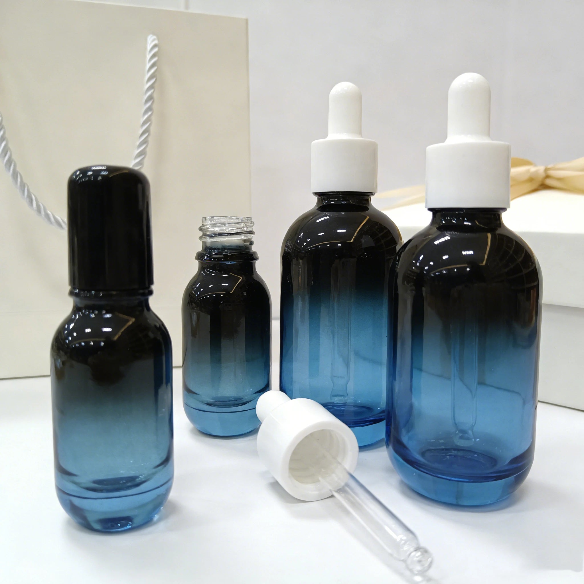 Wholesale 10ml-100ml Glass Perfume Essential Oil Serum Dropper Bottles with Cap and Box - 图片 7