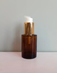 Empty Round 30ml 1oz Amber Glass Lotion Pump Bottle for Essential Oil Hair Oil with Gold Pump