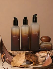 Eco-Friendly Gradient Amber Frosted Glass Skincare Bottle & Jar Set with Lotion Pump Wooden Screw Cap Eco-Packaging