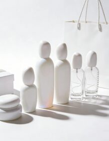 Custom Luxury New Style White Glass Body Lotion Bottle with White Stone Cap Glass Cream Jar for Cosmetic Packaging