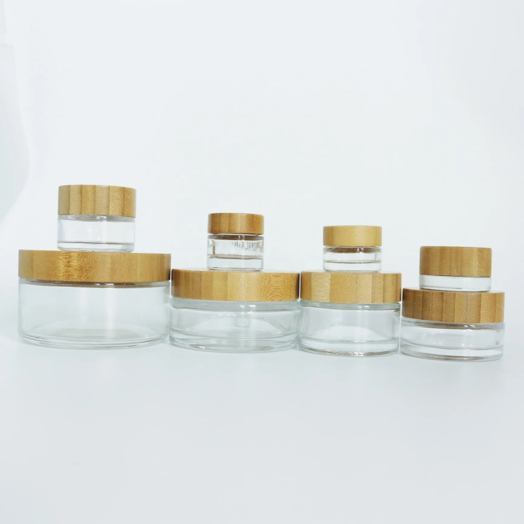 5ml 10ml 15ml 30ml 50ml 100ml 200ml Skin Care Custom Cream Balm Body Butter Cosmetic Glass Jars with Bamboo Wooden Lids