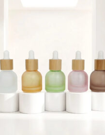 Wholesale 10ml Colorful Frosted Glass Dropper Bottles Set Bamboo Cap Vials for Essential Oil Perfume Travel Cosmetic Packaging