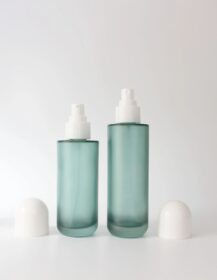 Hot Sale Glass Cosmetic Packaging Lotion Pump Bottle Frosted Dark Green Essence Spray Bottle