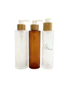 Luxury clear Frosted Flat Shoulder Glass Bottle Jar 100ml 200ml Lotion Bottle with Pump