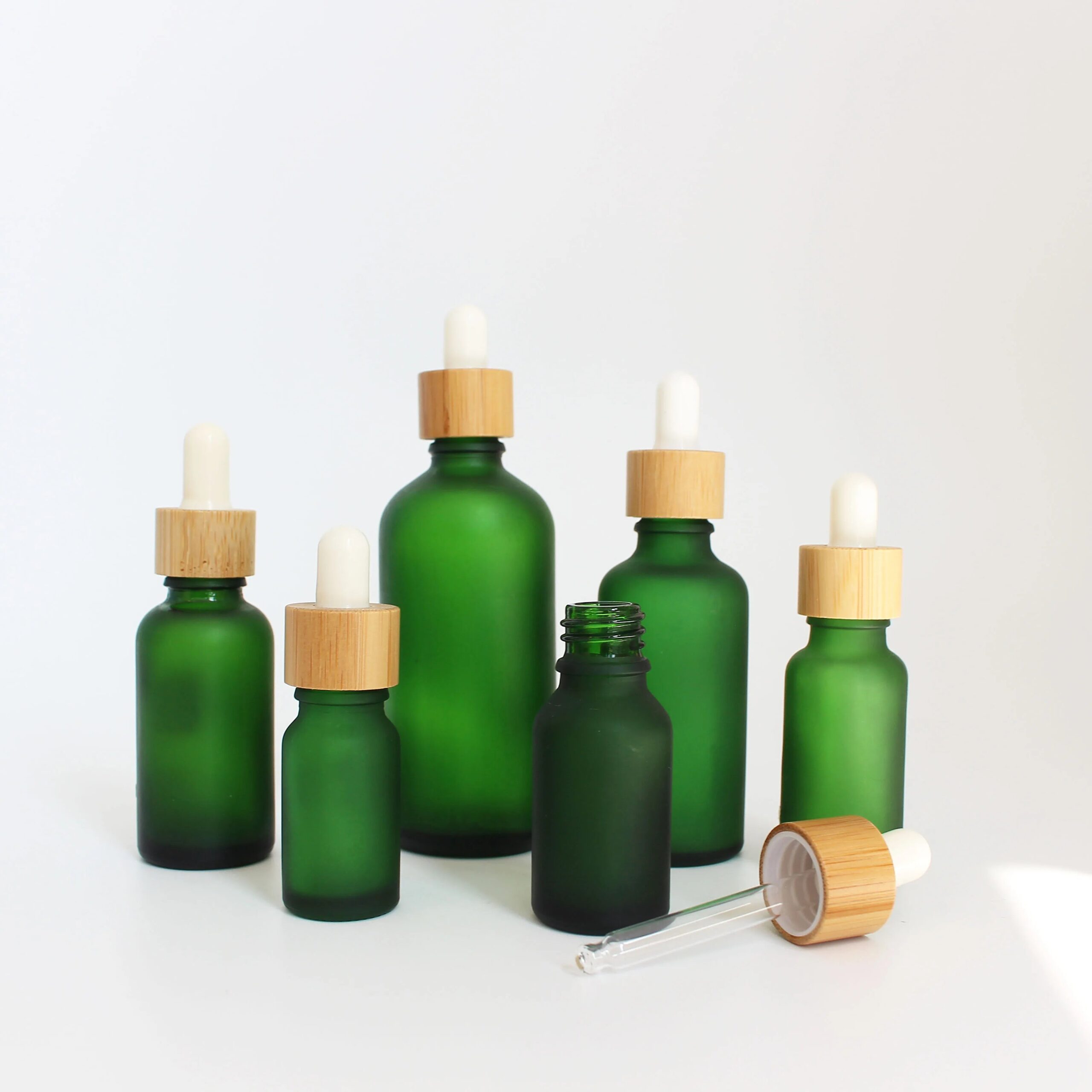 Wholesale Essential Oil Bamboo Lid Frosted Green Glass Dropper Bottle for Serum Packaging - 图片 9