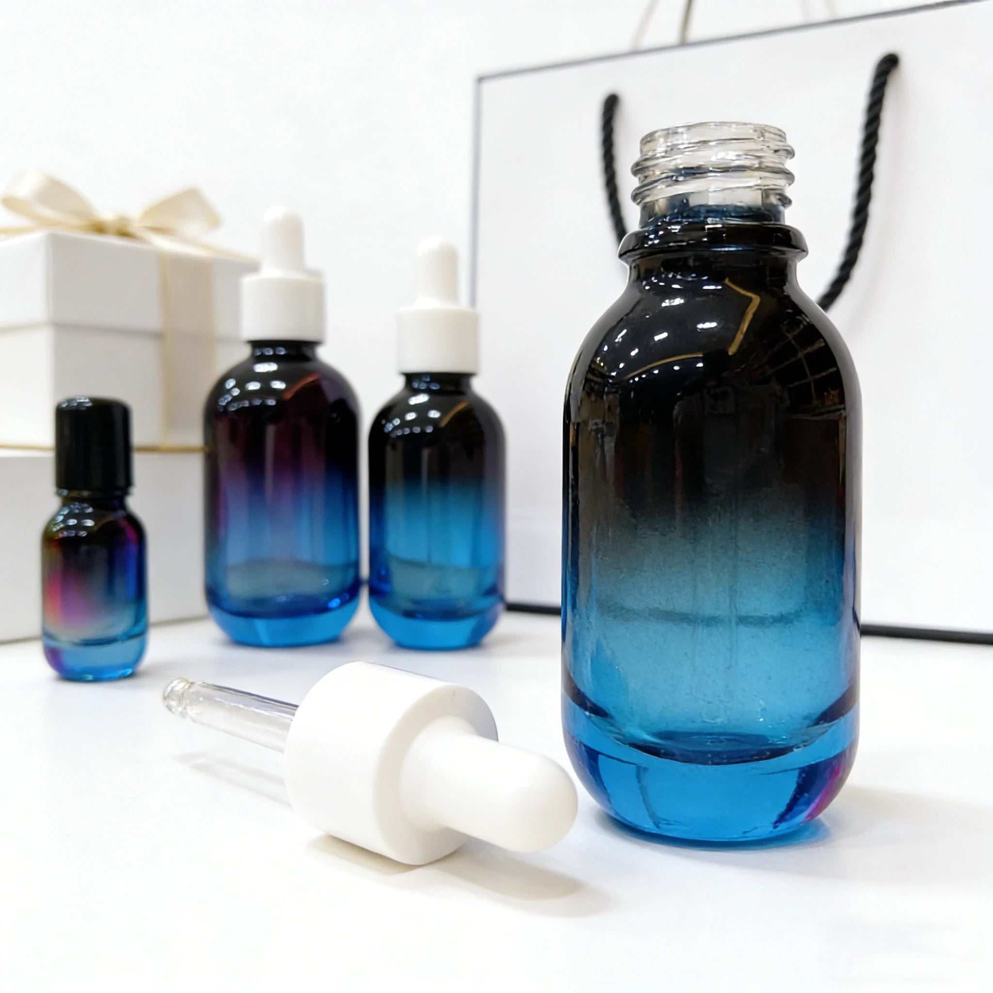 Wholesale 10ml-100ml Glass Perfume Essential Oil Serum Dropper Bottles with Cap and Box - 图片 3