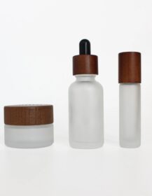 Empty Round OEM Essential Oil Perfume Cosmetic Skin Care Ash Wood Walnut Wood Cap Glass Oil Bottle Frosted