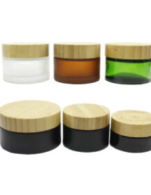 Customized Amber Matte Black Empty 5g 10g 15g 30g 100g clear Frosted Glass Skin Care Cream Jars with Bamboo Lid