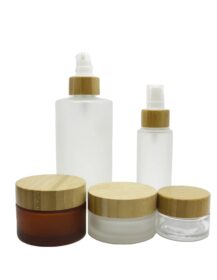 Oem Ecofriendly Bamboo Cosmetic Packaging Cream Jar Empty Pump Bottle Set Bamboo Glass Bottle for Lotions With Bamboo Lids Wood