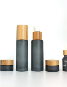 Custom Color 30ml 50ml 60ml 100ml 120ml Bamboo Cosmetic Packaging Lotion Pump Glass Spray Dropper Bottle with Wood Bamboo Lid