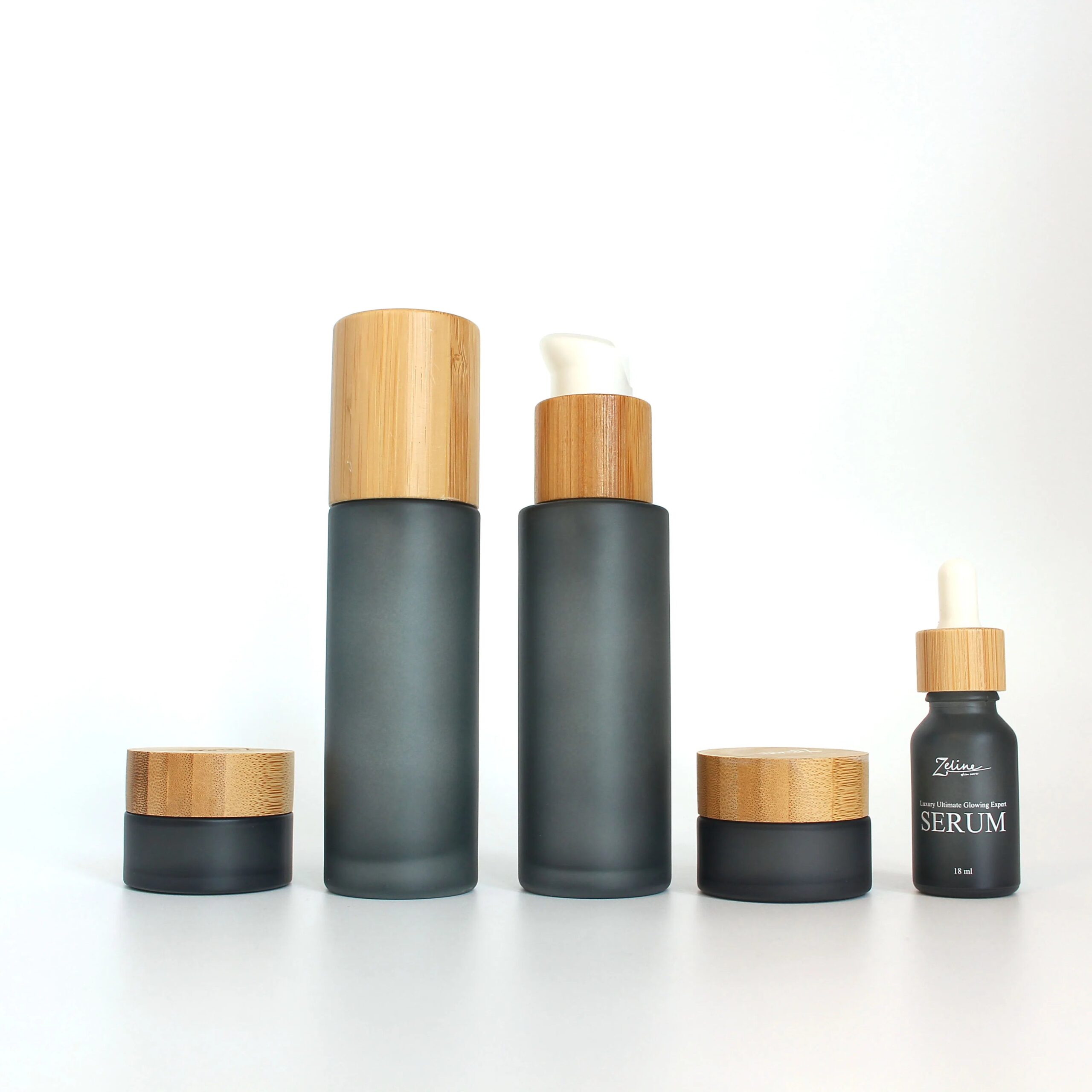 Custom Color 30ml 50ml 60ml 100ml 120ml Bamboo Cosmetic Packaging Lotion Pump Glass Spray Dropper Bottle with Wood Bamboo Lid