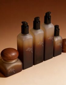 Eco-Friendly 100ml Gradient Amber Frosted Glass Skincare Lotion Pump Bottle with Wooden Cap and Matte Finish