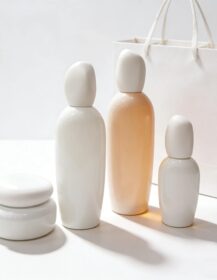 Elegant White Glass Serum 30ml 50ml 100ml 120ml Lotion Pump Toner Bottle 30g 50g Jar Stone Shape Lid Skincare Packaging