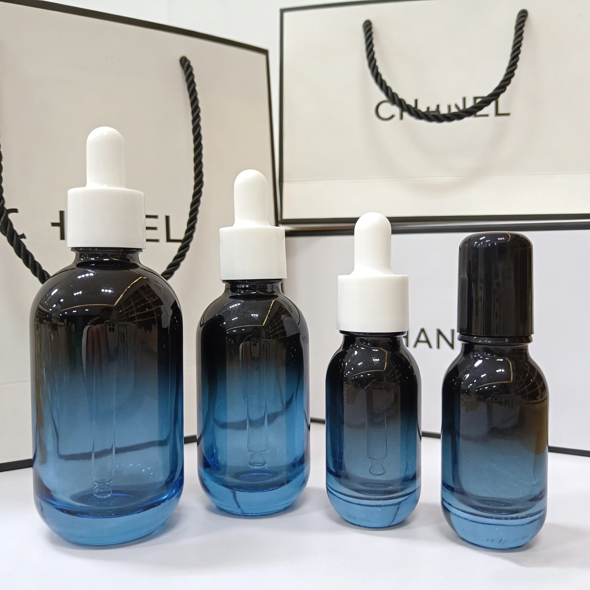 Wholesale 10ml-100ml Glass Perfume Essential Oil Serum Dropper Bottles with Cap and Box - 图片 4