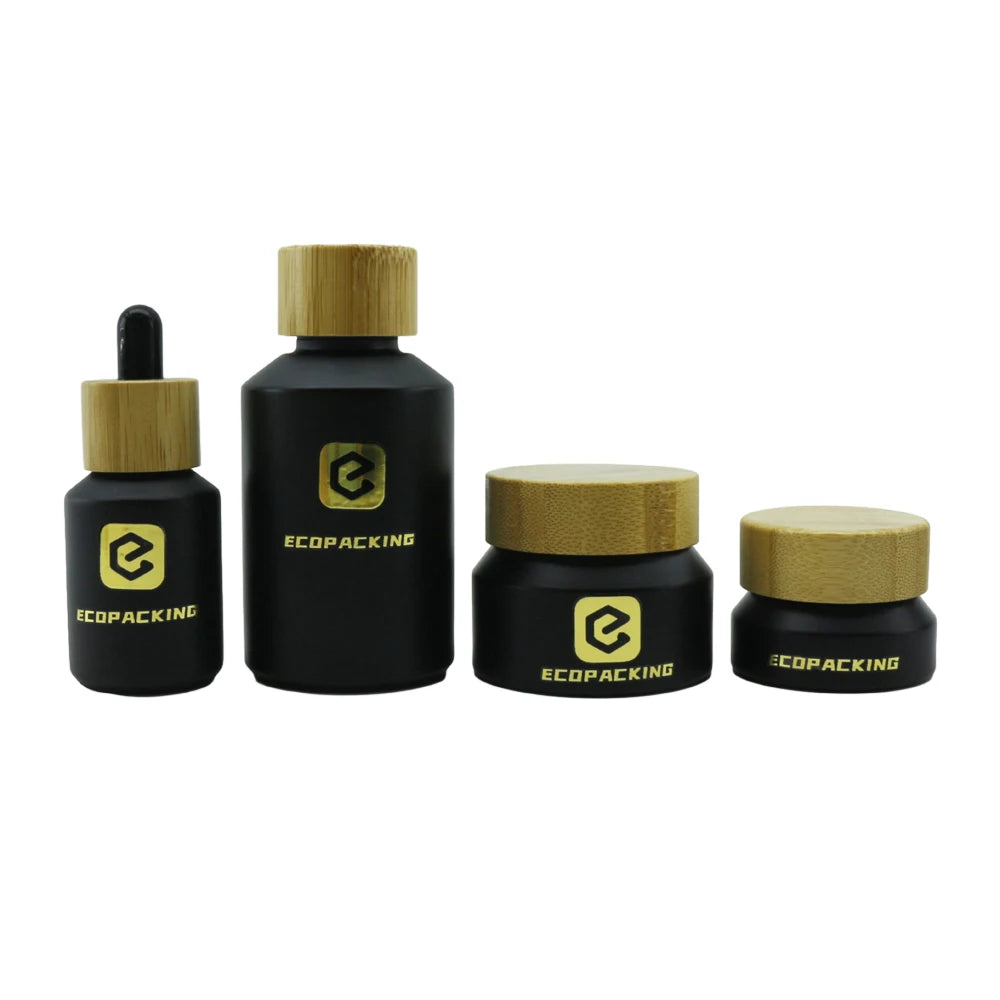 Slant Shoulder Skincare Black Essential Oil Bottle Glass Cosmetic Serum Dropper Bottles Glass Cream Jars Set With Bamboo Lid