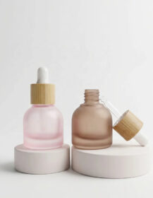 Luxury 10ml Frosted Glass Dropper Bottles with Bamboo Lid Refillable Essential Oil Bottles for Cosmetic Brand OEM