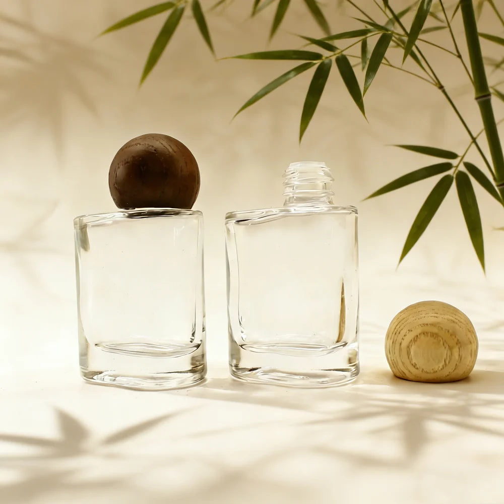 Hot Selling New Design Wood Cap 40ml Customized Logo Empty Essential Oils Glass Bottle