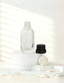 Wholesale Heavy Duty Clear Glass Bottles 10ml 30ml 50ml Bulk Empty Essential Oil Containers for Aromatherapy Lab Use