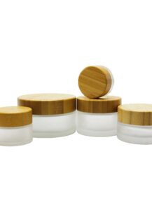 Frosted Clear Face Cream Lotion Cosmetic Glass Jar With Engraved Logo Bamboo  Lid