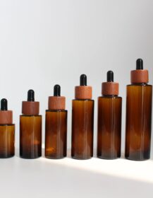 Empty Leakproof 30ml 50ml 100ml Essential Oil Amber Glass Dropper Bottles with Bamboo/Wooden Lid