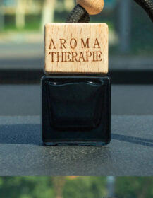Wholesale 8ml air Freshener Diffuser Empty Frosted Black Car Hanging Perfume Bottle with Wooden Cap